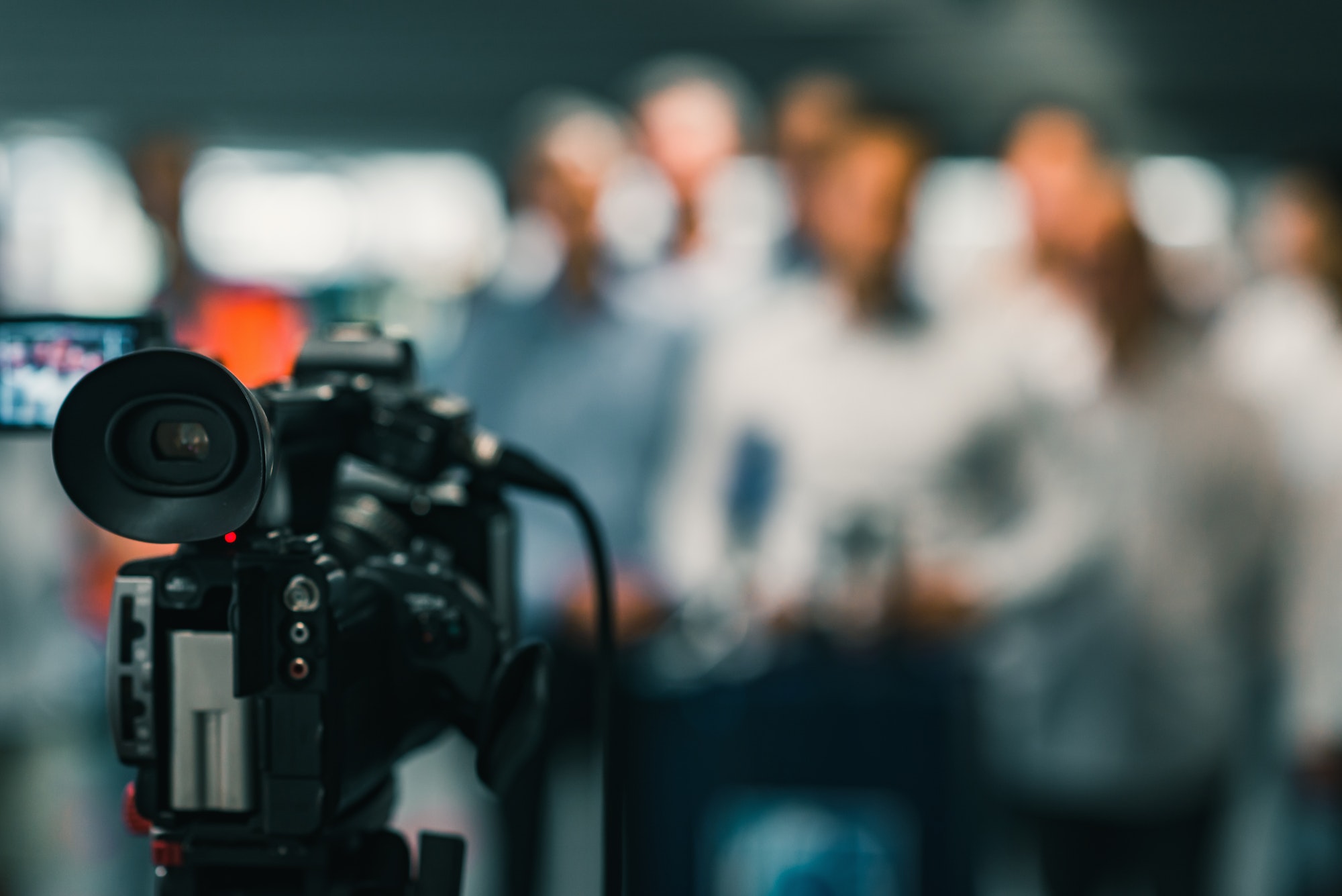 Camera at media conference